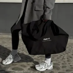 Czarny shopper z guzikiem